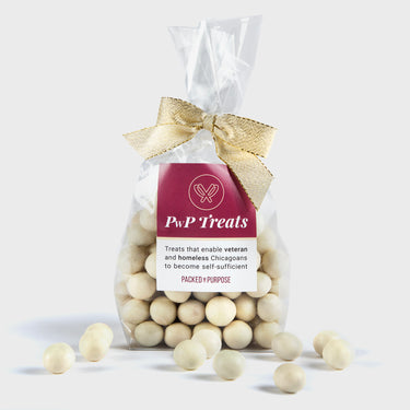 Packed with Purpose white chocolate-bag, it support veterans and unhoused individuals in Chicago through purpose-driven gifting